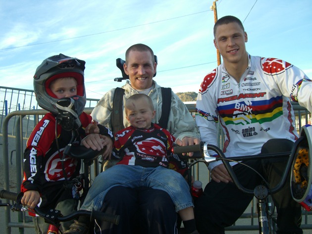 The next generation of champions! Stephen all smiles with his children [and their BMXs] alongside Olympic BMX gold medallist Maris Strombergs. – Lake Perris, Riverside.