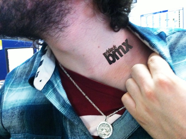 Ride UK neck tattoo.