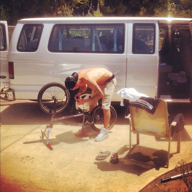 Ben Wallace fixing his bike before heading to Dennis Enarson's place.