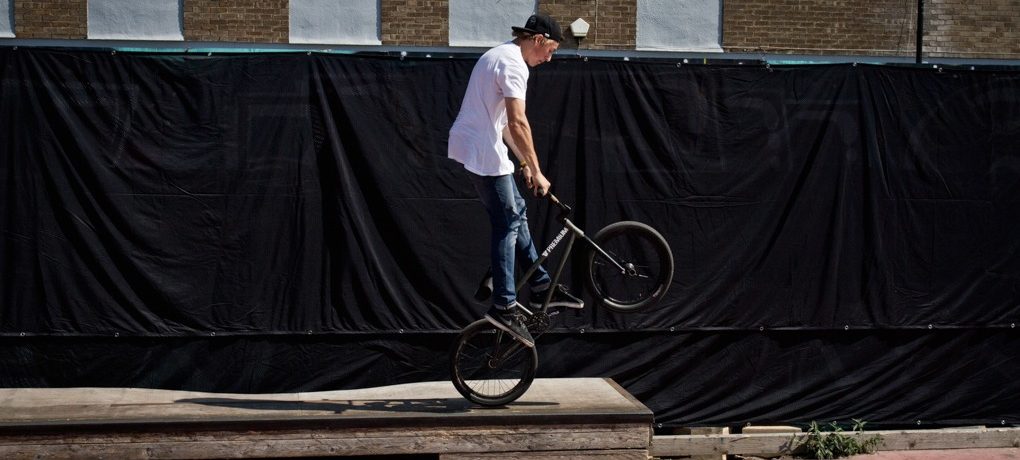 As you come to the edge of the object you need to start shifting your weight back on the bike, pulling backwards on the bars as to shift the weight off the front end.