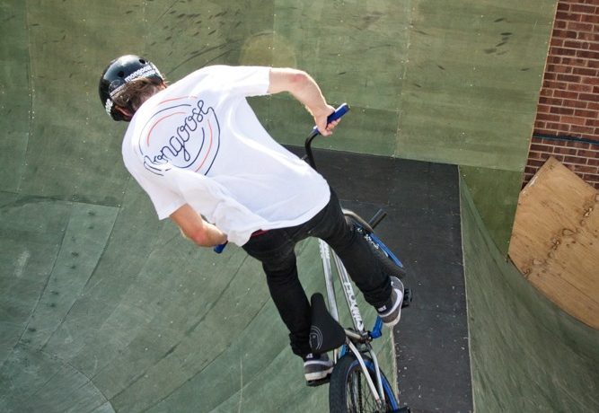 As you take off, start spinning as you would a normal 360. You should come around to 180 easily. Look over your inside shoulder and try and spot your landing.