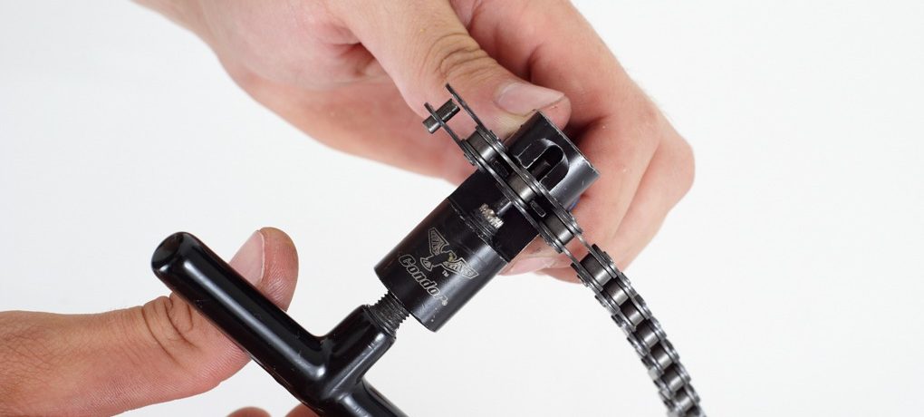 Take the tool and turn out the broken link. Make sure as you turn the pin out of the chain you don’t push it all the way out.