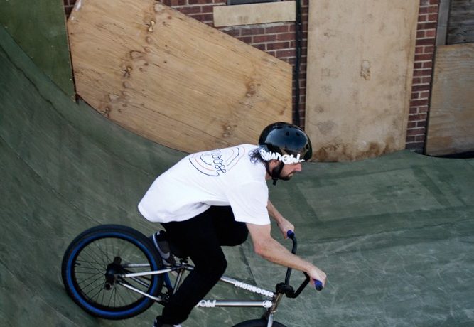 As the back wheel comes over, start pushing down with your legs as the wheel comes down the final part of the transition. You can really maximize your speed by doing this.