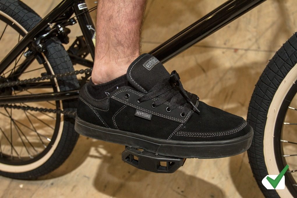 person with black shoes showing correct BMX foot placement