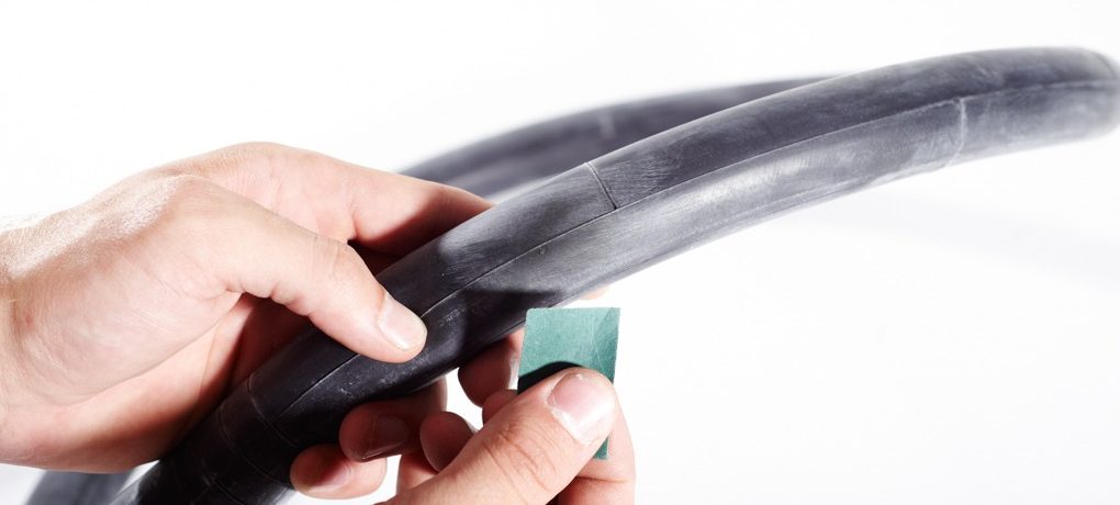 It’s important that the tube is dry and the surface is rough, otherwise the glue is likely to peel back. Use the sandpaper to take the surface off the tube.