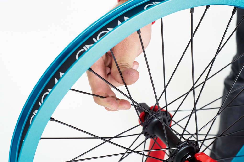 Once you’ve tightened up the buckled area, check the tightness of the rest of the spokes. If they seem loose, work around the wheel giving every spoke the same amount of turn until they’re tight.